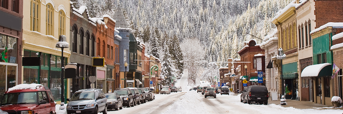 main street park city utah in winter with snow