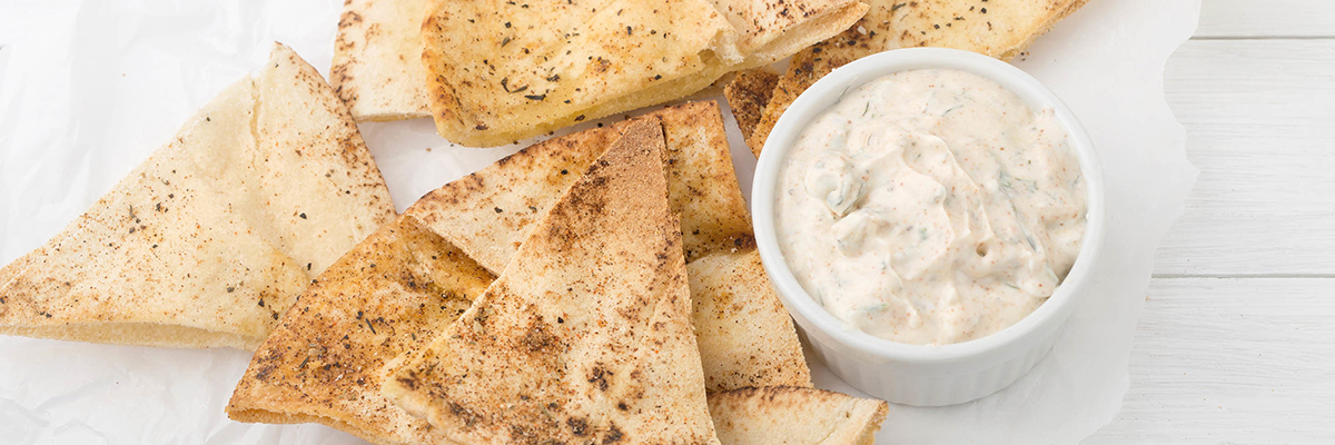 warm pita bread and tziki dip
