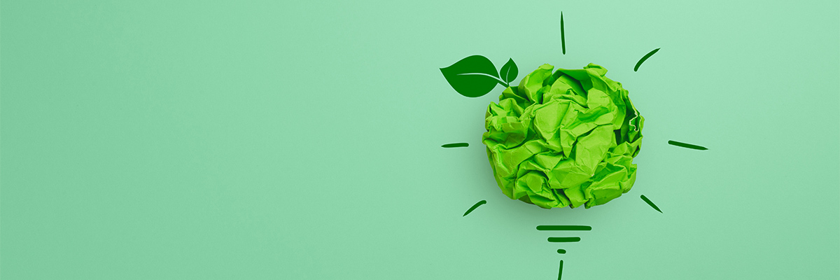 Green lightbulb graphic with folded paper