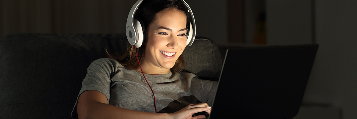 Woman watching a laptop