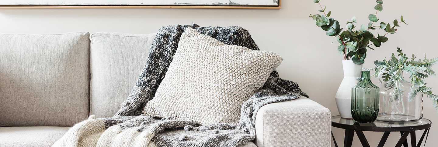 Pillow and blanket on coach